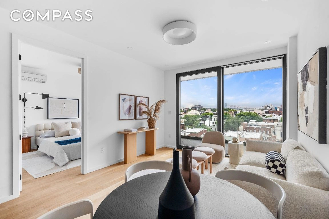 Queens living room with private outdoor terrace in February 2025
