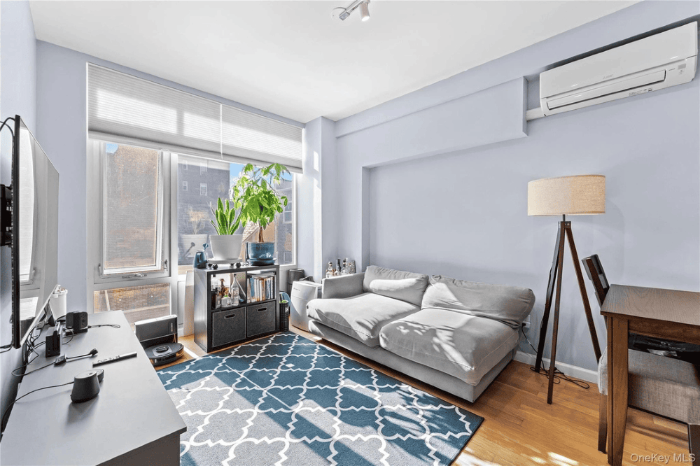 Queens unit with private balcony and in unit washer and dryer